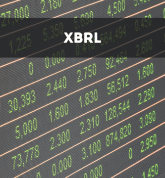 Pantalla de monitor mostrando números y datos financieros en formato digital